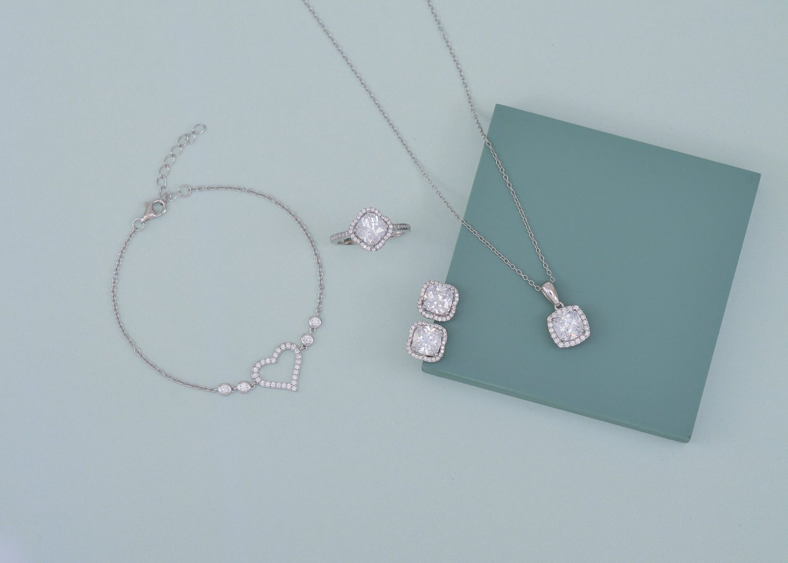 Flat lay of colourful gemstone jewellery representing birthstones