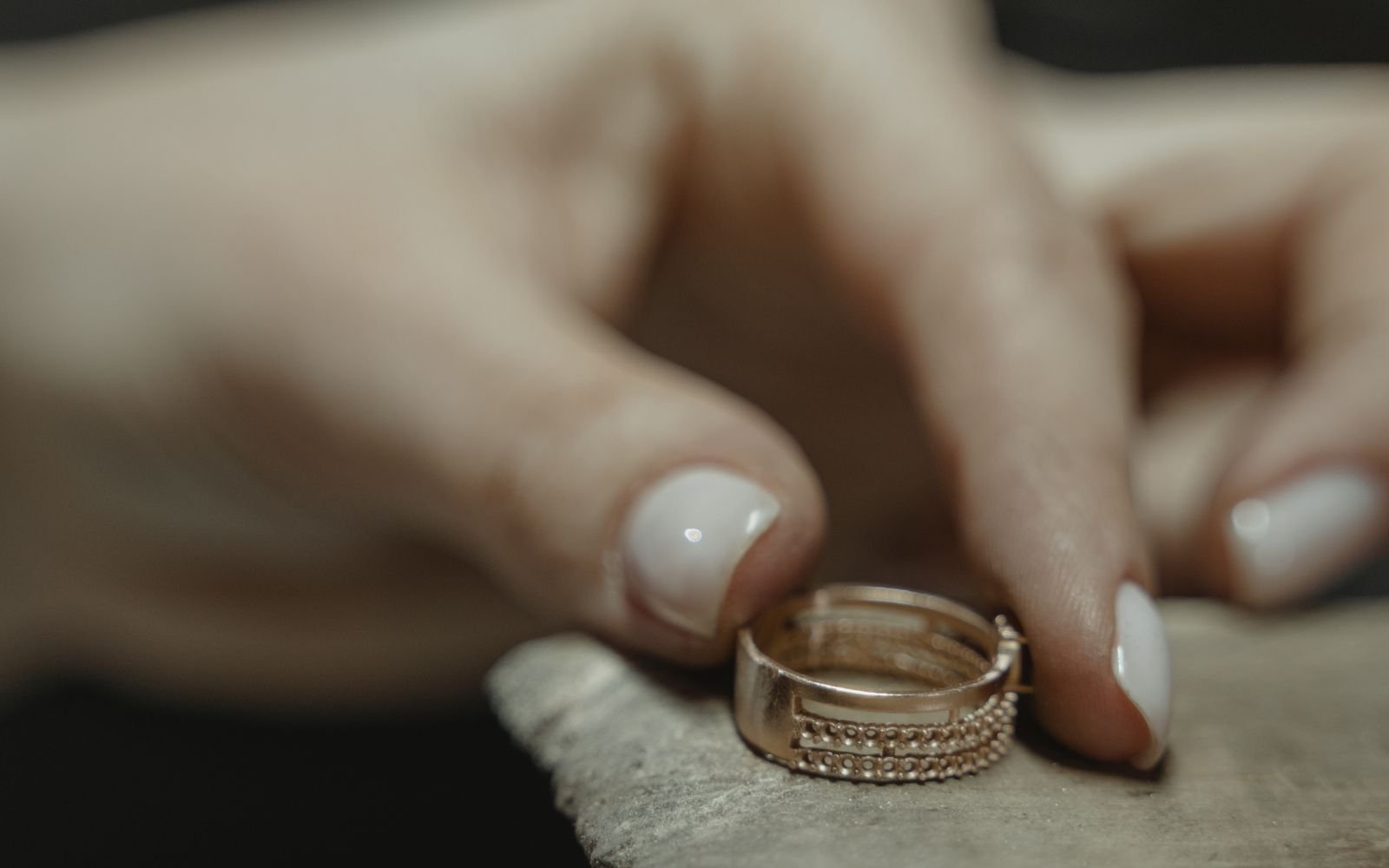 Bold statement gold ring styled on hand