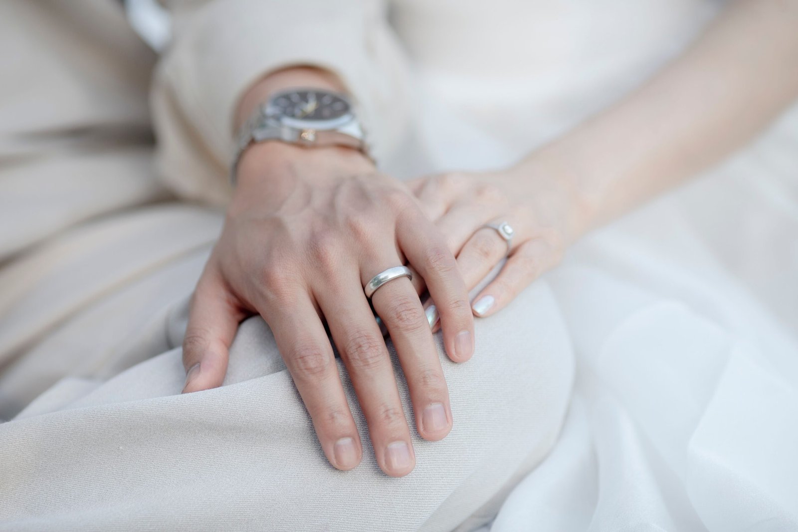 Close up of a delicate promise ring on hand